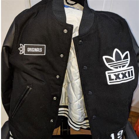 adidas black leather jacket.